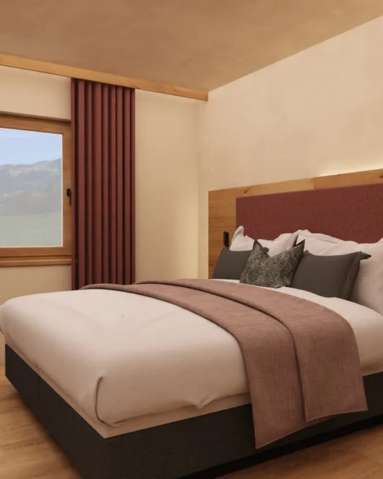 Gemütliches Hotelzimmer mit Doppelbett, Holzmöbeln und Bergblick